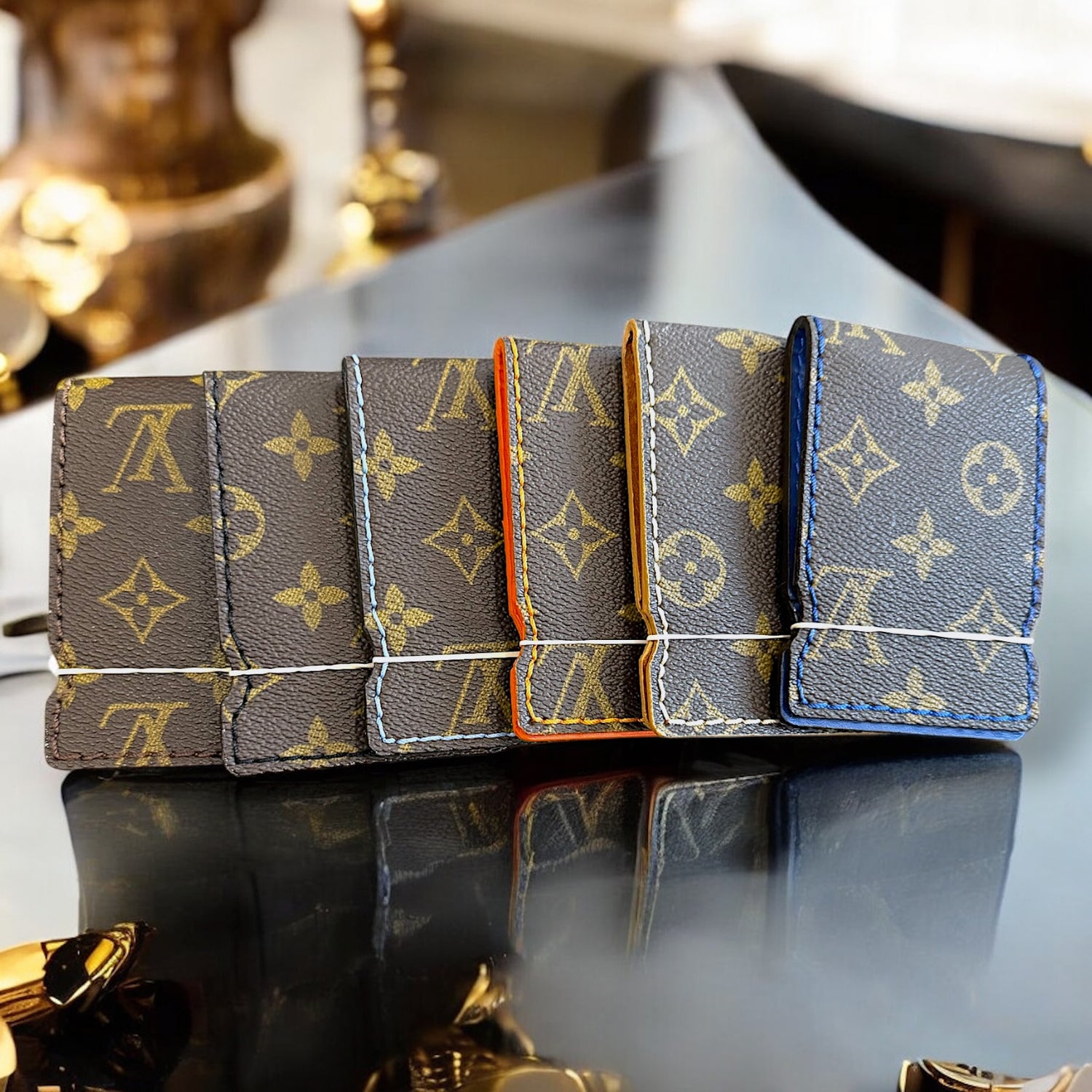 The French Connection Cash Cover: Re-purposed LV- Mono Carolina