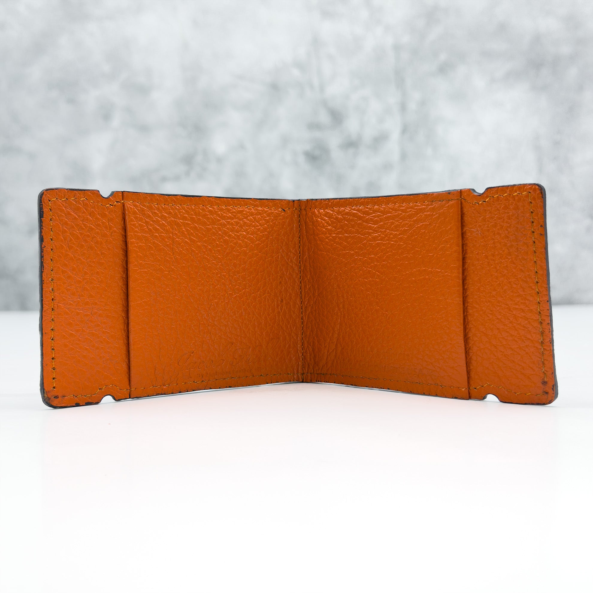 Ostrich Quill Cash Cover: W.D.E