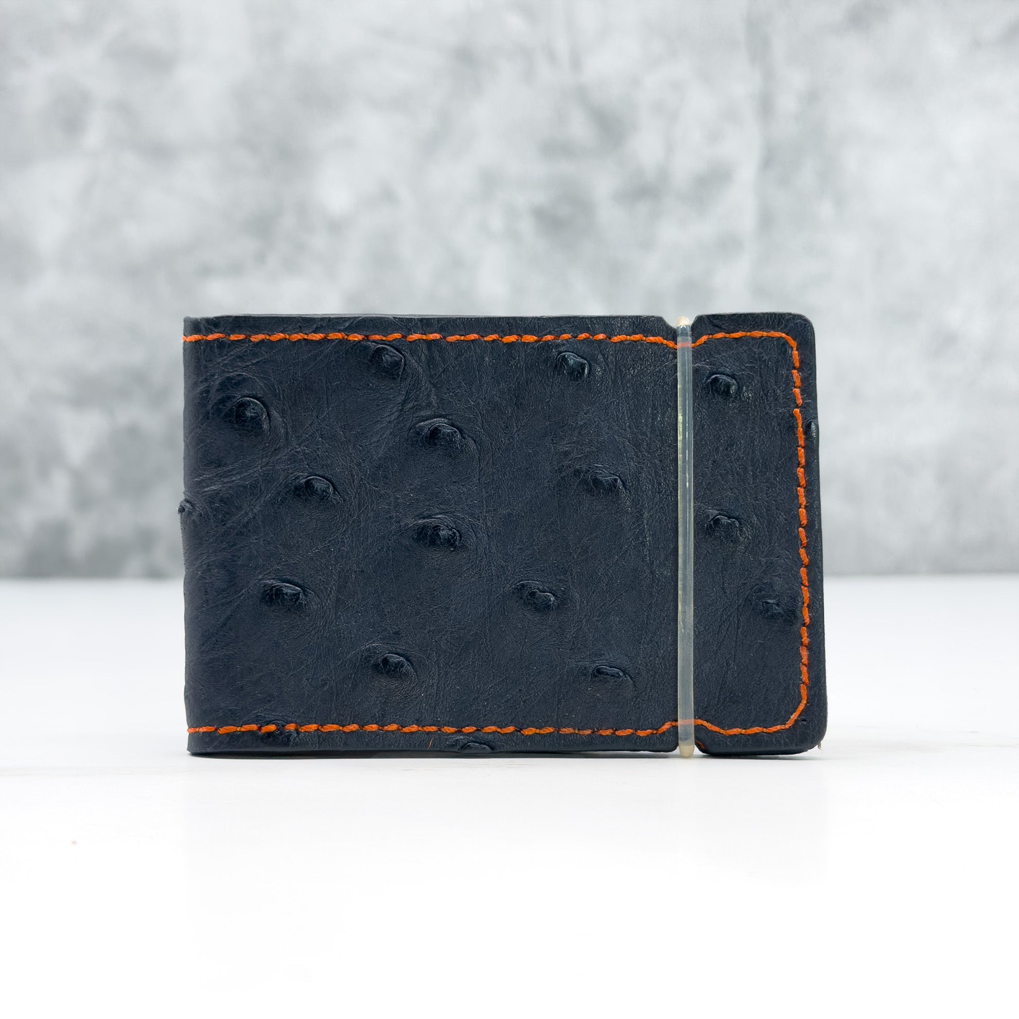 Ostrich Quill Cash Cover: W.D.E