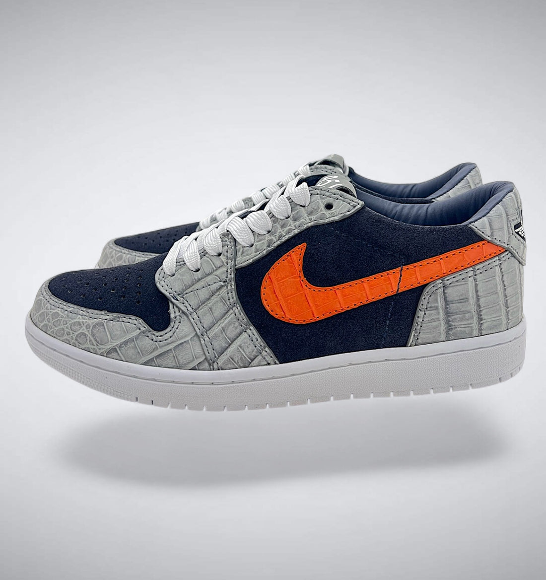 Navy suede and grey alligator custom AJ1 Low with orange alligator accents
