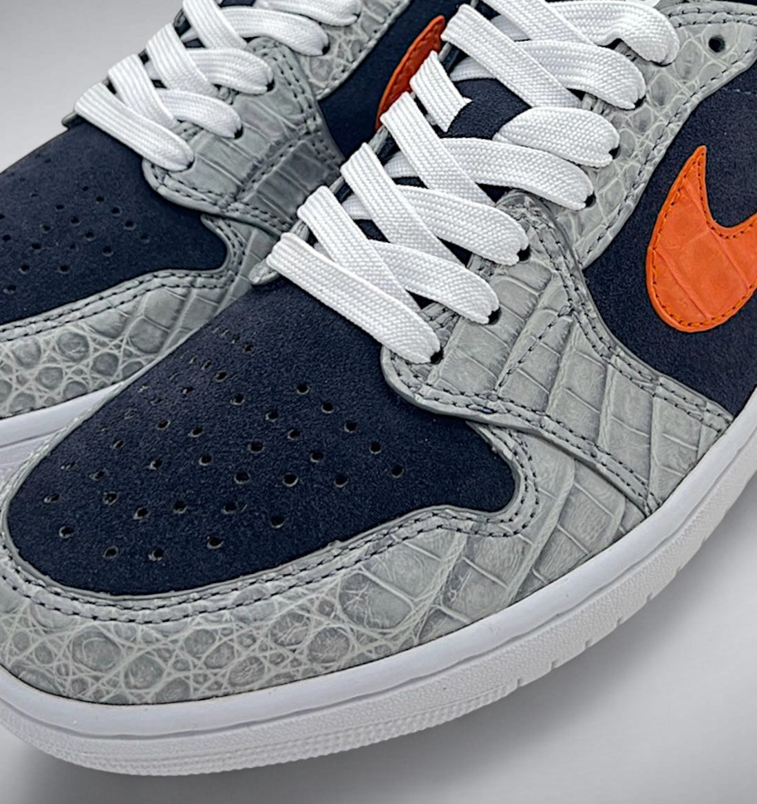 Close Up Navy suede and grey alligator custom AJ1 Low with orange alligator accents
