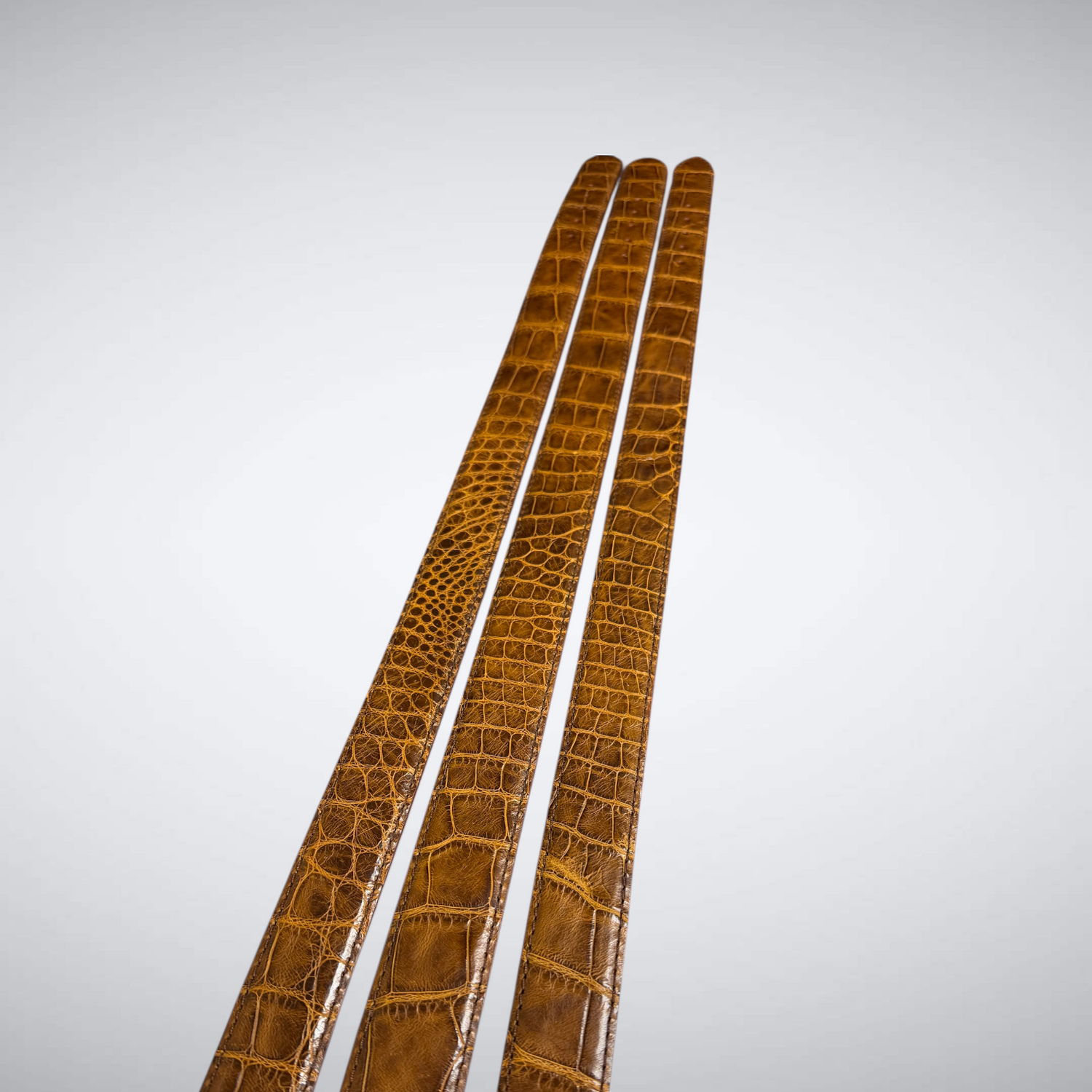 Three Sonoran brown toned Alligator Belts by Jacob Hill Leather 